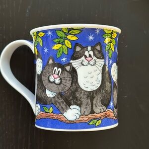 Whimsical Blue and Black Cats Mug by Jane Brookshaw